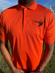 CLASSIC PERFORMANCE POLO ORANGE.   - BLACK LOGO